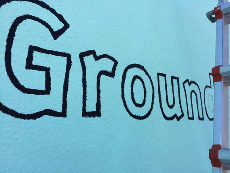 The large outdoor wall lettering was made with the help of the drawing robot Botsy.