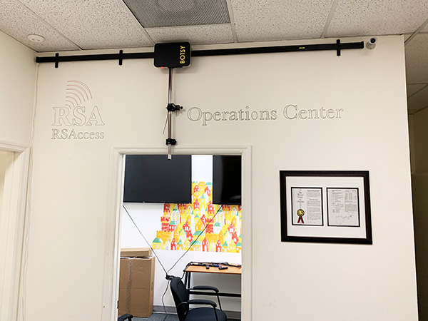 This is an office logo and a large lettering transfer on a wall. It can be a good alternative to the projector, punch paper, carbon transfer paper.