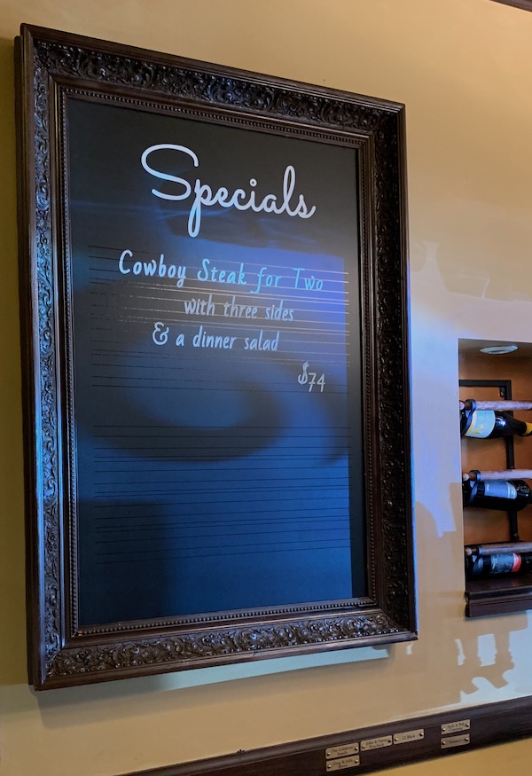 Botsy outlines chalkboard menu art for restaurants, cafes and bars. Using wet erase markers, the clients can edit the drawings easily.